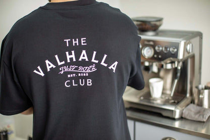 Man making a coffee in black and white brazilian jiujitsu t-shirt