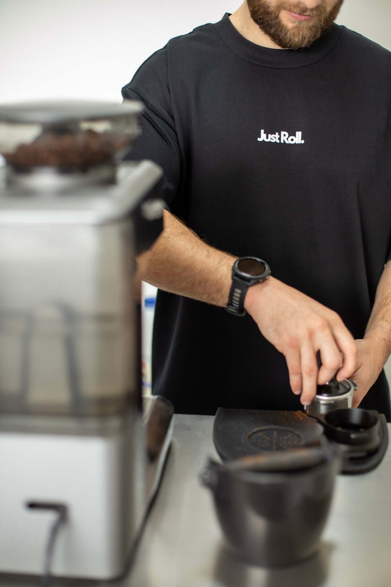  Man making a coffee in black and white brazilian jiujitsu t-shirt